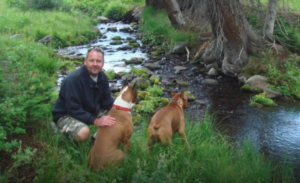 owner operator russ with his boxer dogs